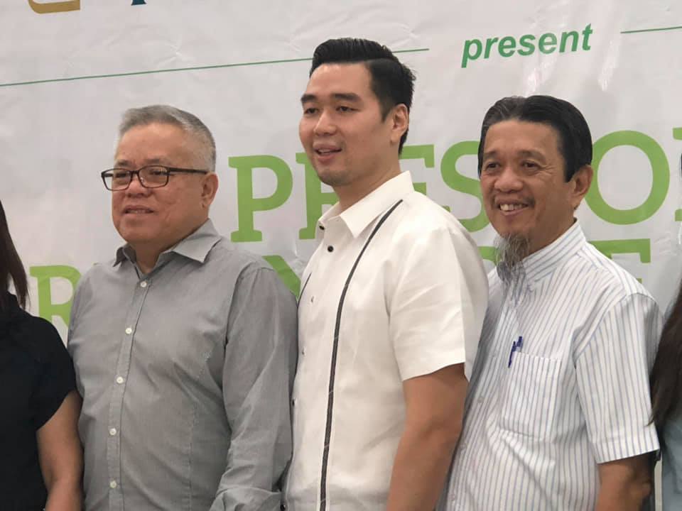 Vincent Co and Lucio Co of Puregold at an event