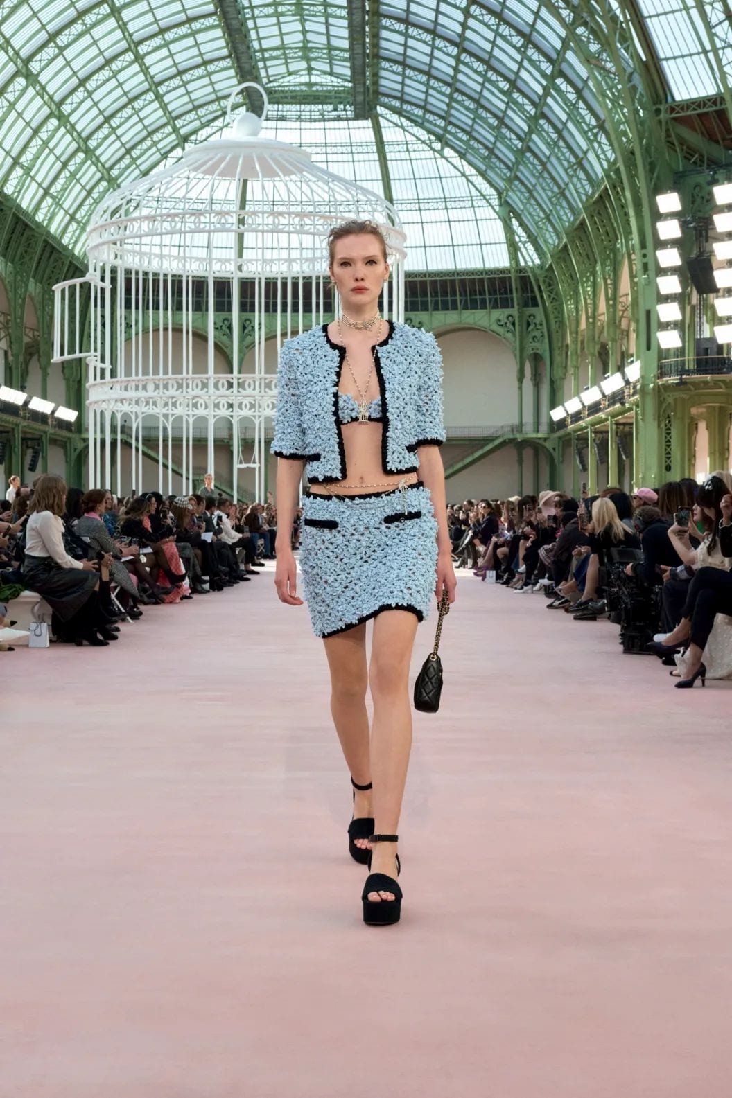 The Mesh Clutch spotted on Look 38 from Chanel's Spring/Summer 2025 presentation during Paris Fashion Week.