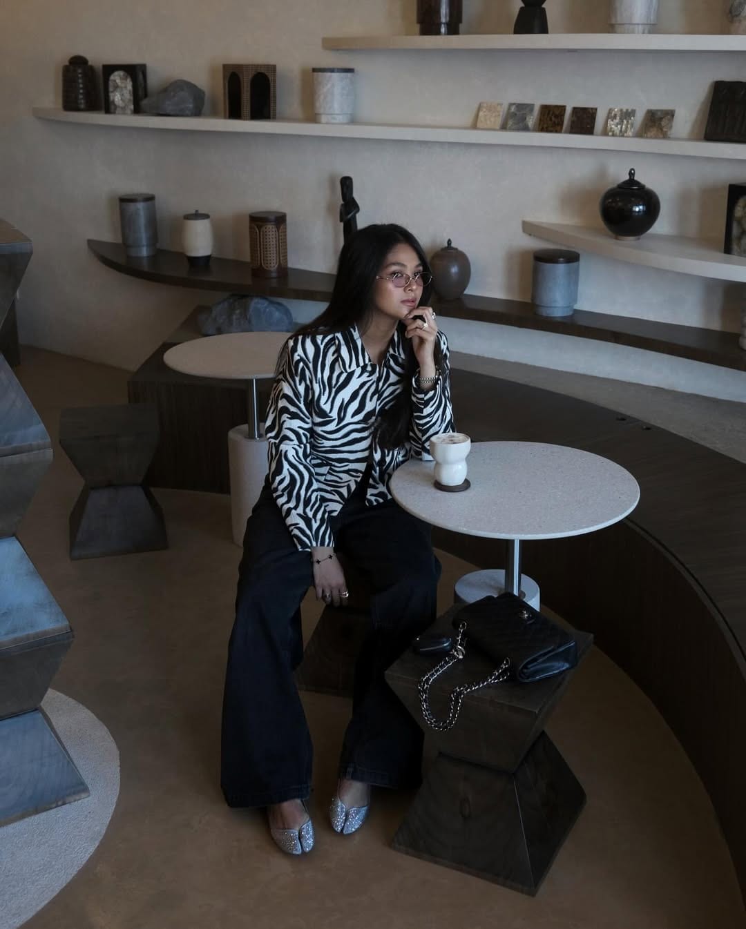 Filipina fashion influencer Angelique Manto wearing the Marlougiela Strass in silver