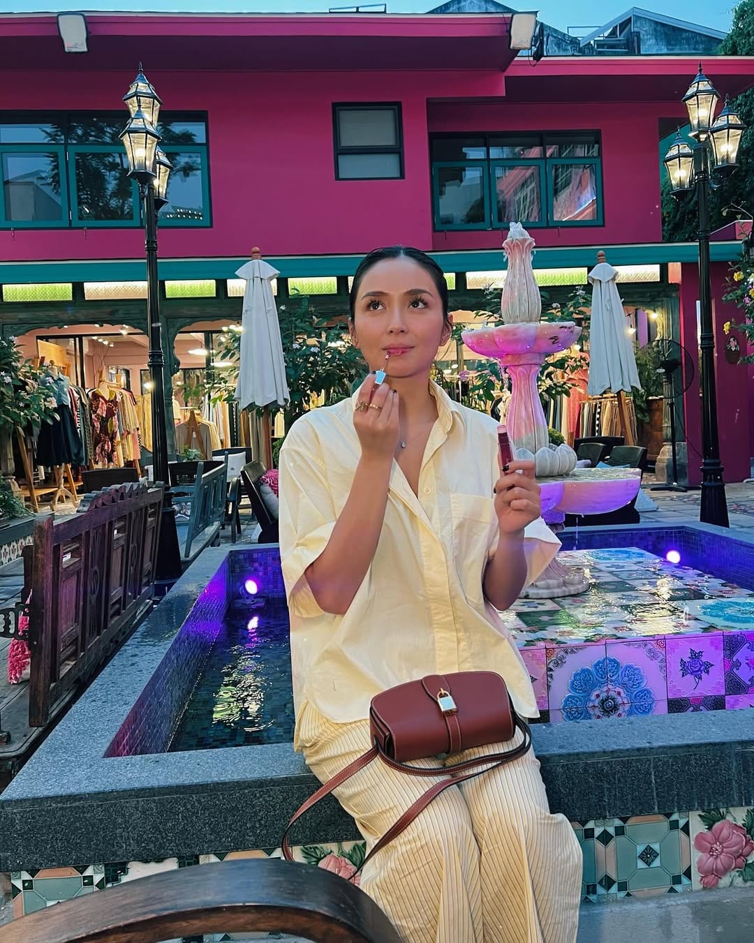 Kathryn Bernardo with her Celine Tabou Clutch