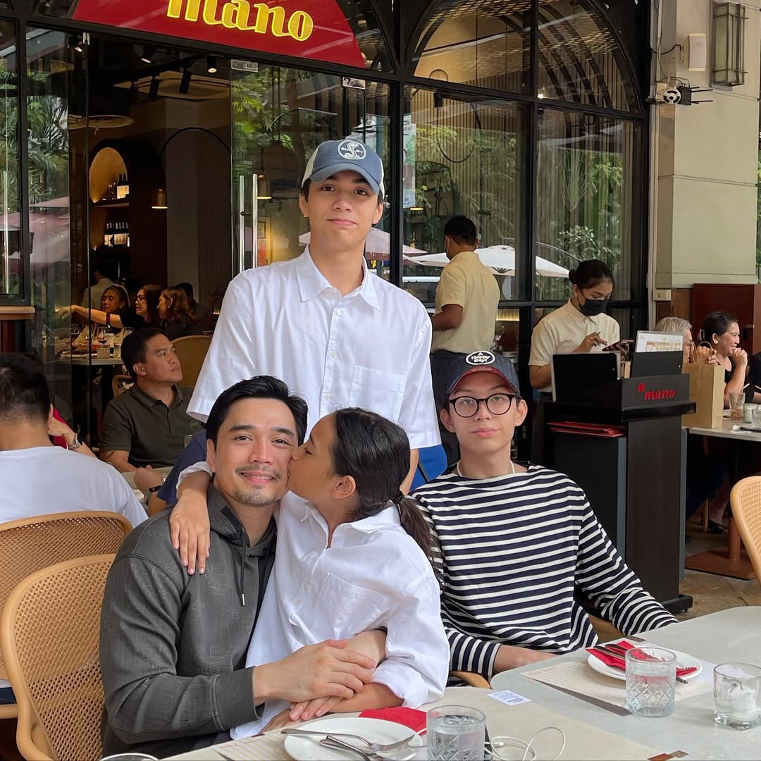 Inigo Jose with his dad and siblings