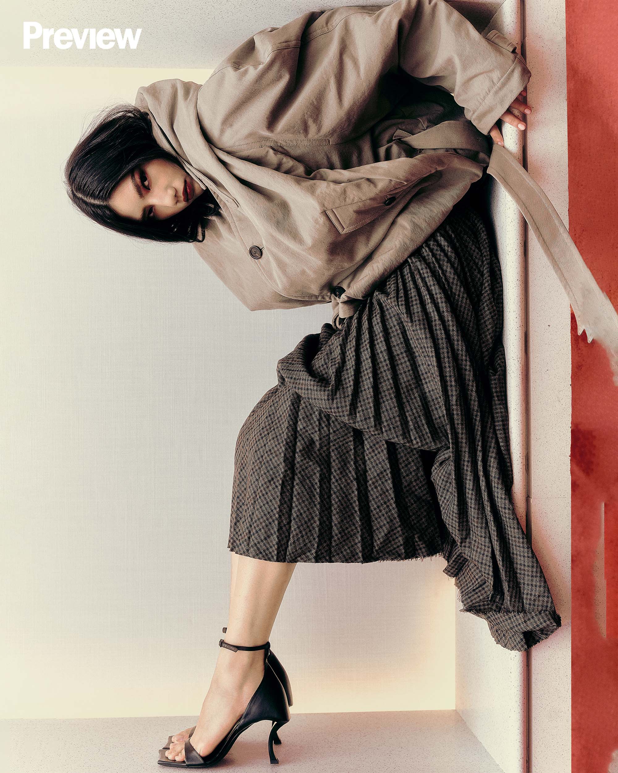 ON FRANCHESKA: Hooded trench - Dark beige/Black, P263,500. Pleated skirt - Khaki/Navy, P242,500. Hourglass sandal, P82,500, BALENCIAGA, Greenbelt 4.