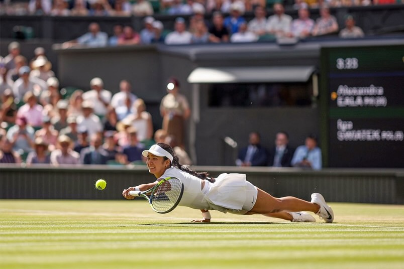 Alex Eala hits tennis ball