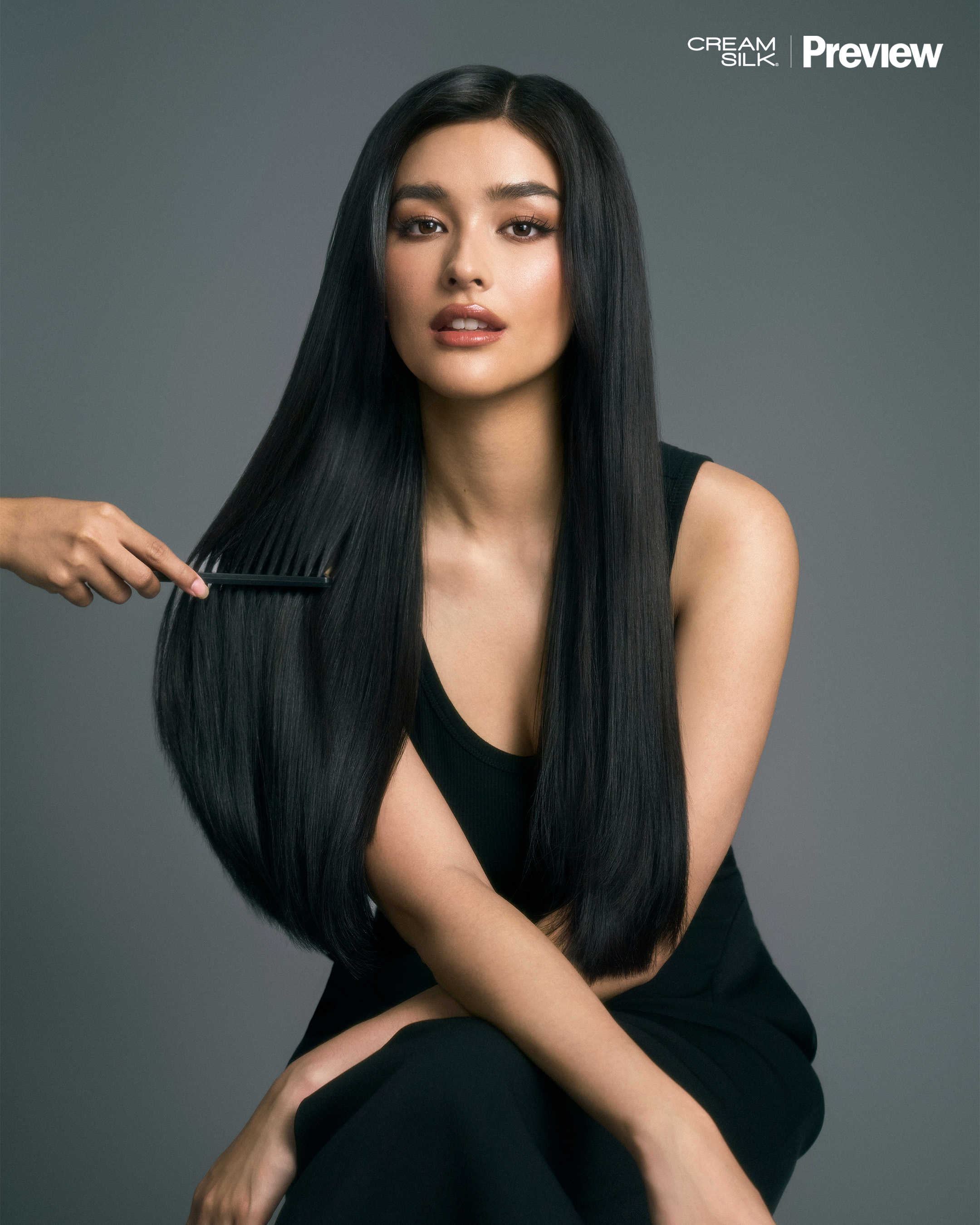 Liza Soberano with a hand combing her hair