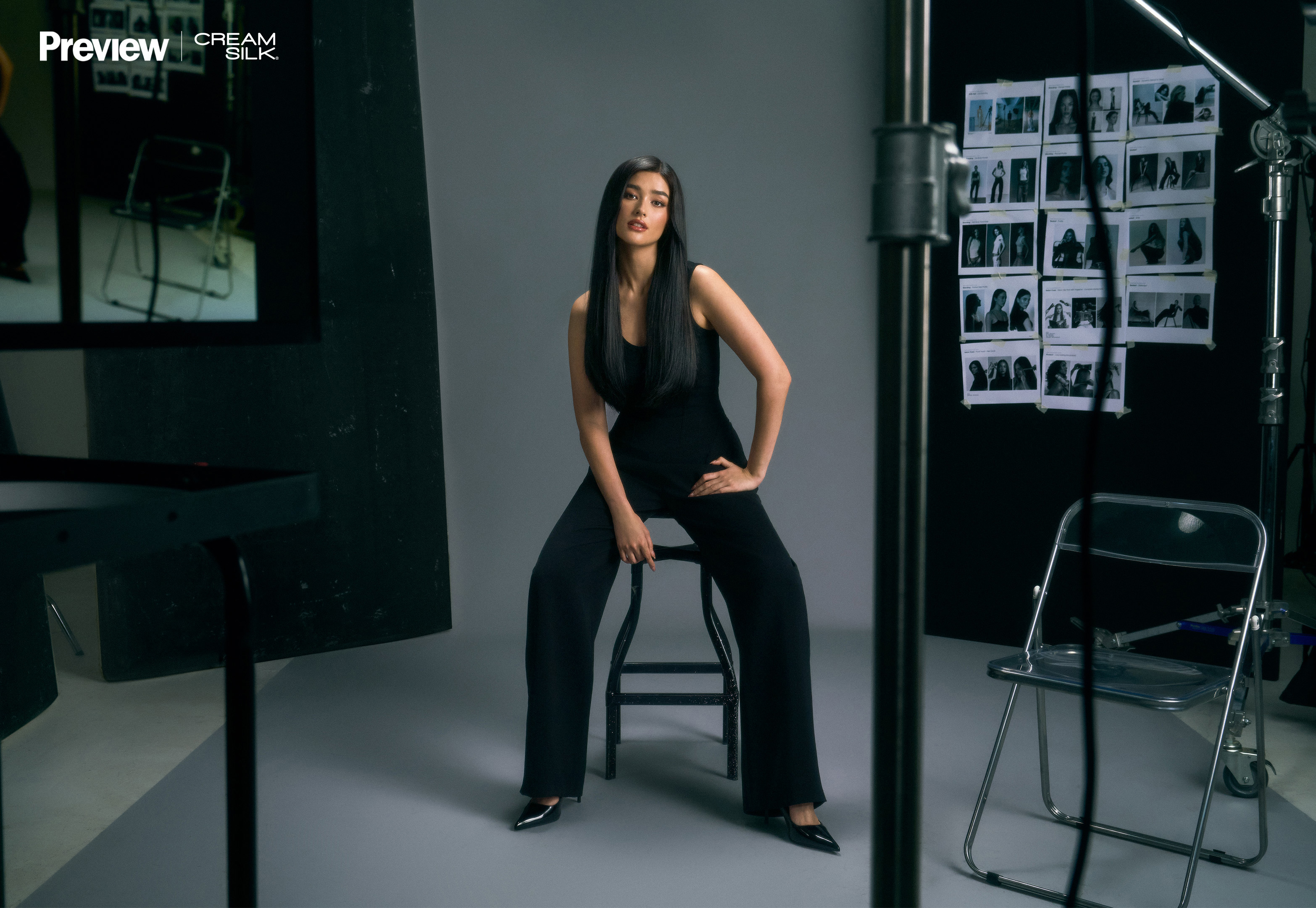 Liza Soberano sitting on a chair with her arm on her thigh