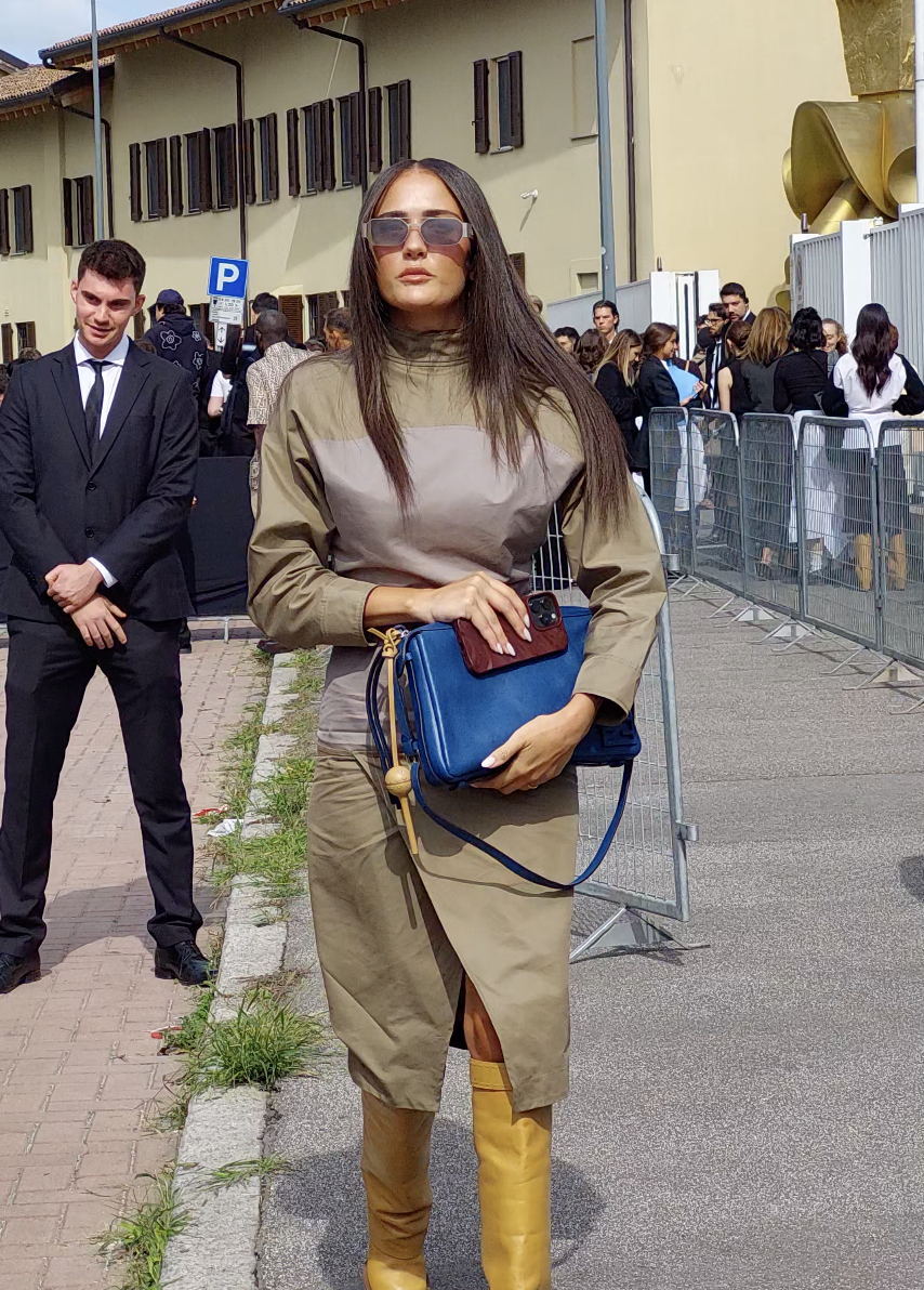 Woman in yellow boots attending Paris Fashion Week