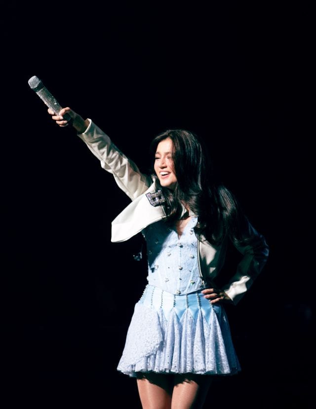 Belle Mariano in a light blue corset and racer skirt 